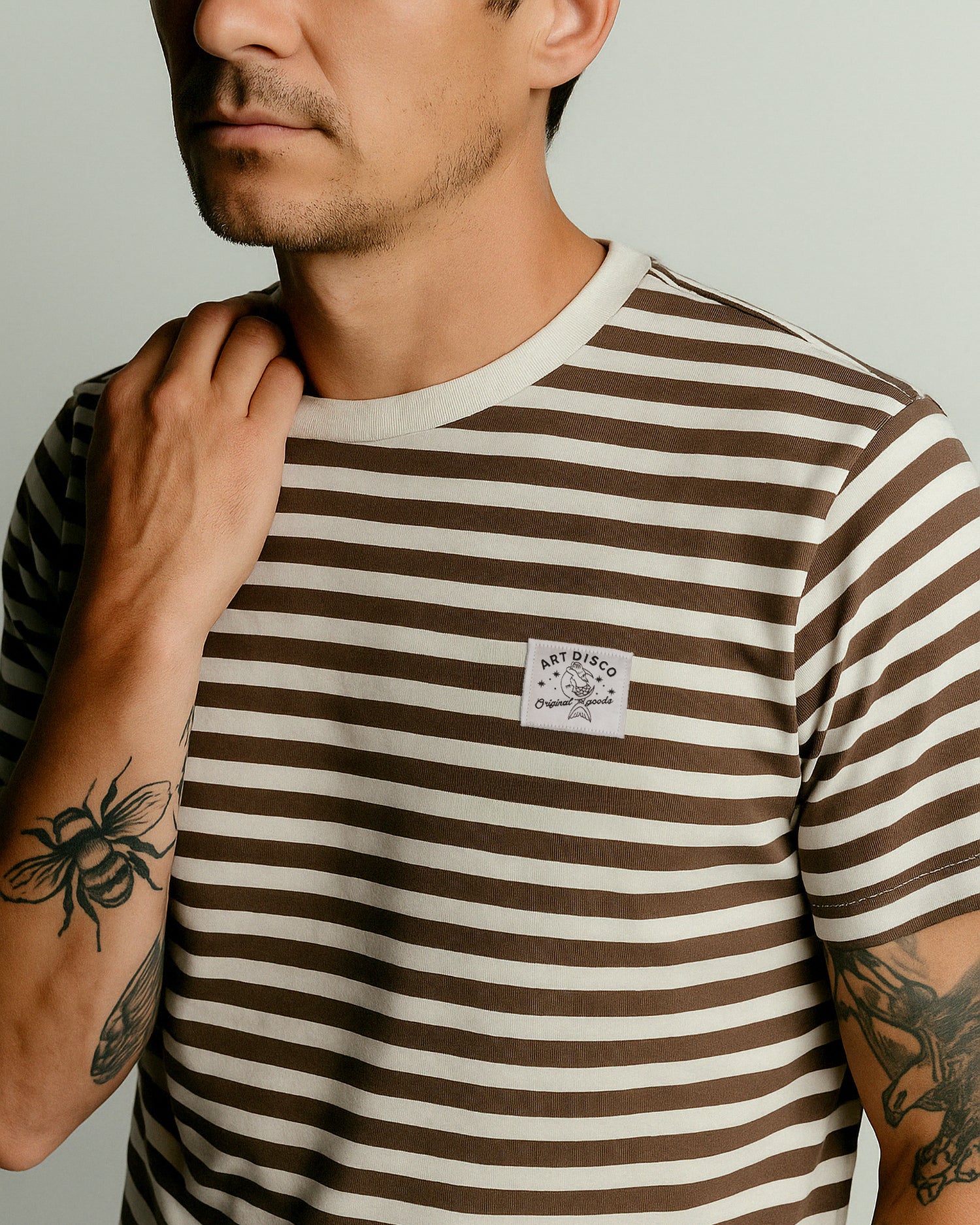 The Rover Striped Brown and White t-shirt by Art Disco in Whitby, North Yorkshire