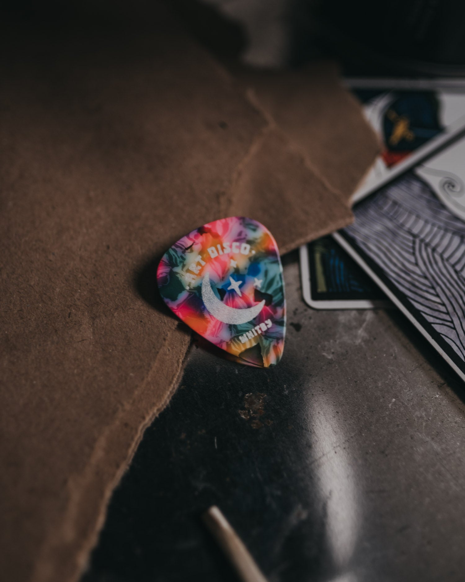 Plectrum for opening the Art Disco lidded candles