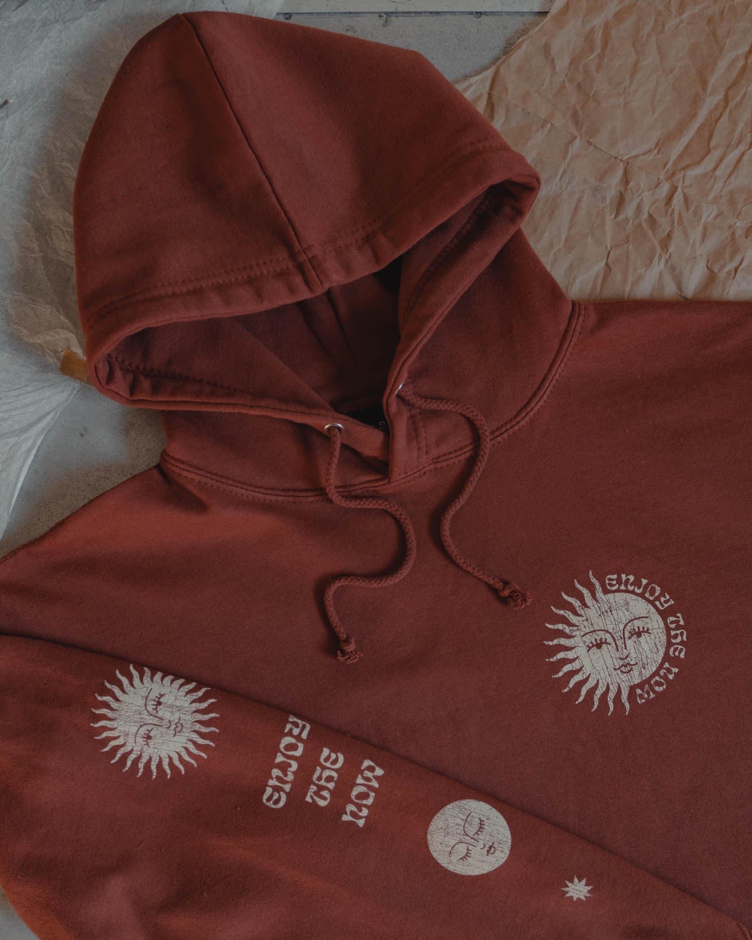 Terracotta hoody with sun and moon design by Art Disco Original Goods