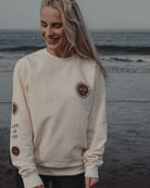 Cream 'Enjoy the Now' sweatshirt by ART DISCO Original Goods with sleeve print