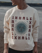 Inhale Exhale cream sweatshirt with sun moon and stars design by Art Disco Original Goods