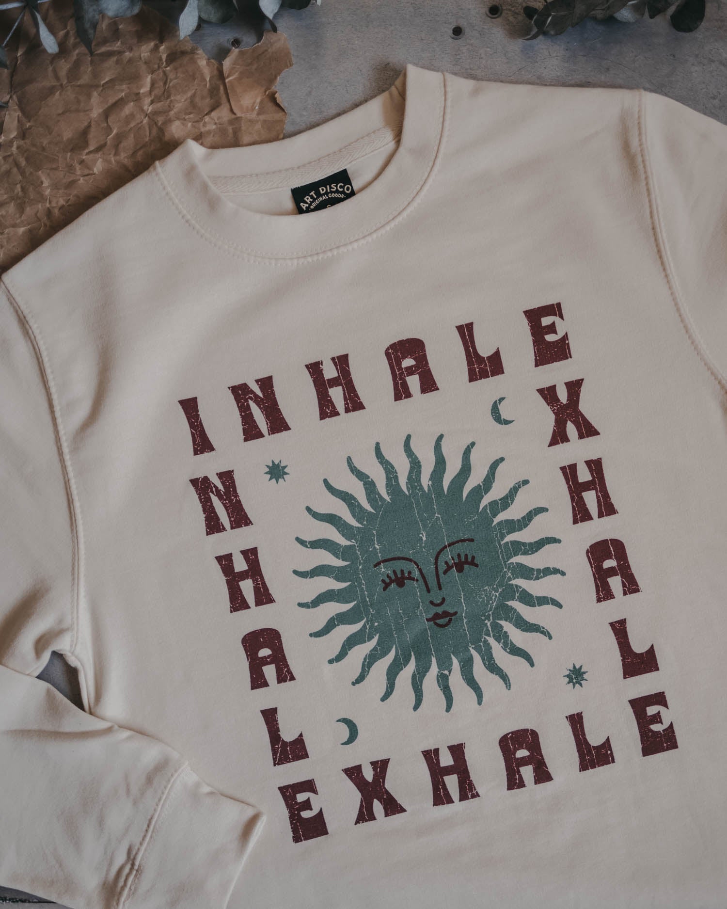 Inhale Exhale cream sweatshirt with sun moon and stars design by Art Disco Original Goods