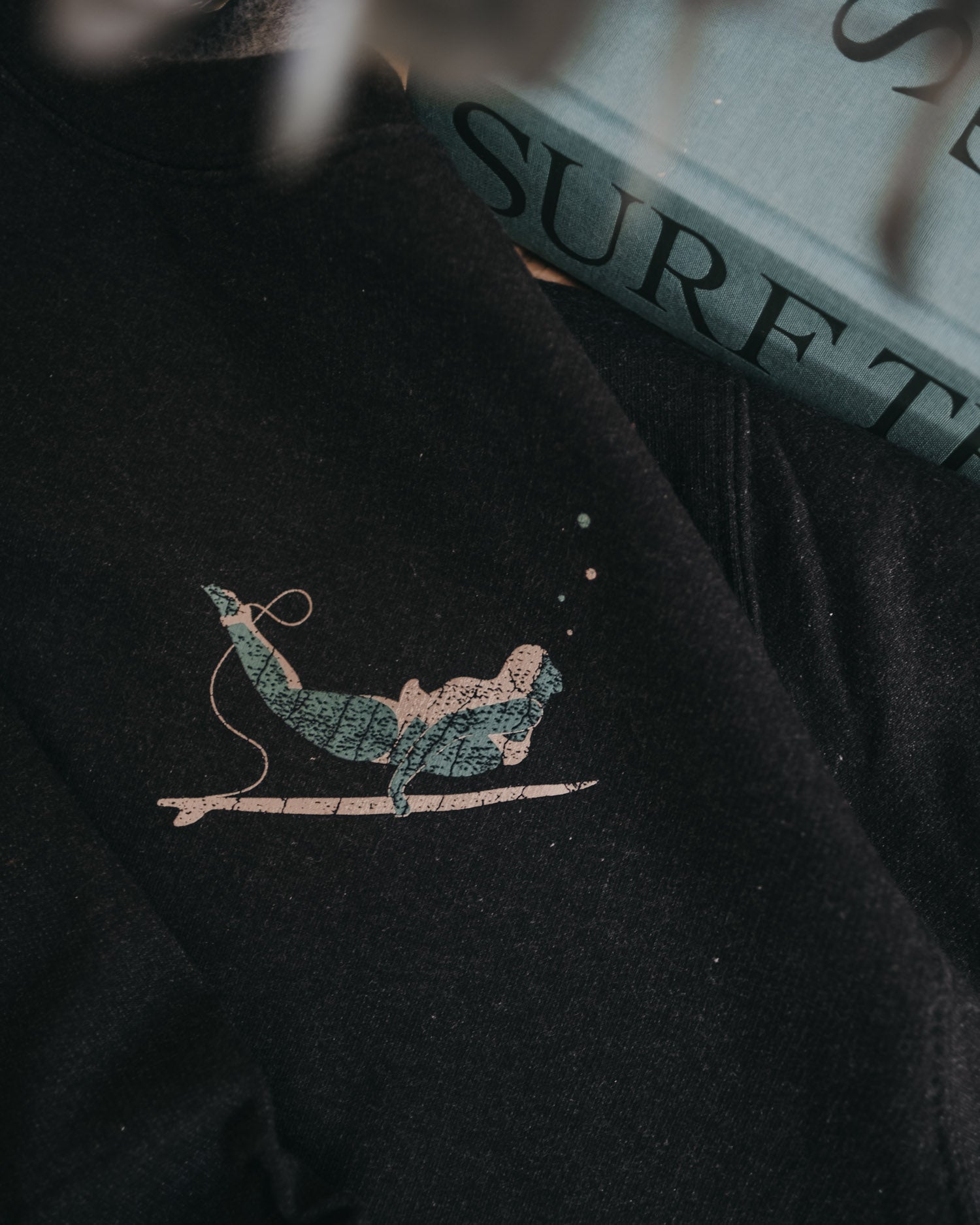 Wild Dreamer Black Sweatshirt with surfer on front by ART DISCO Original Goods