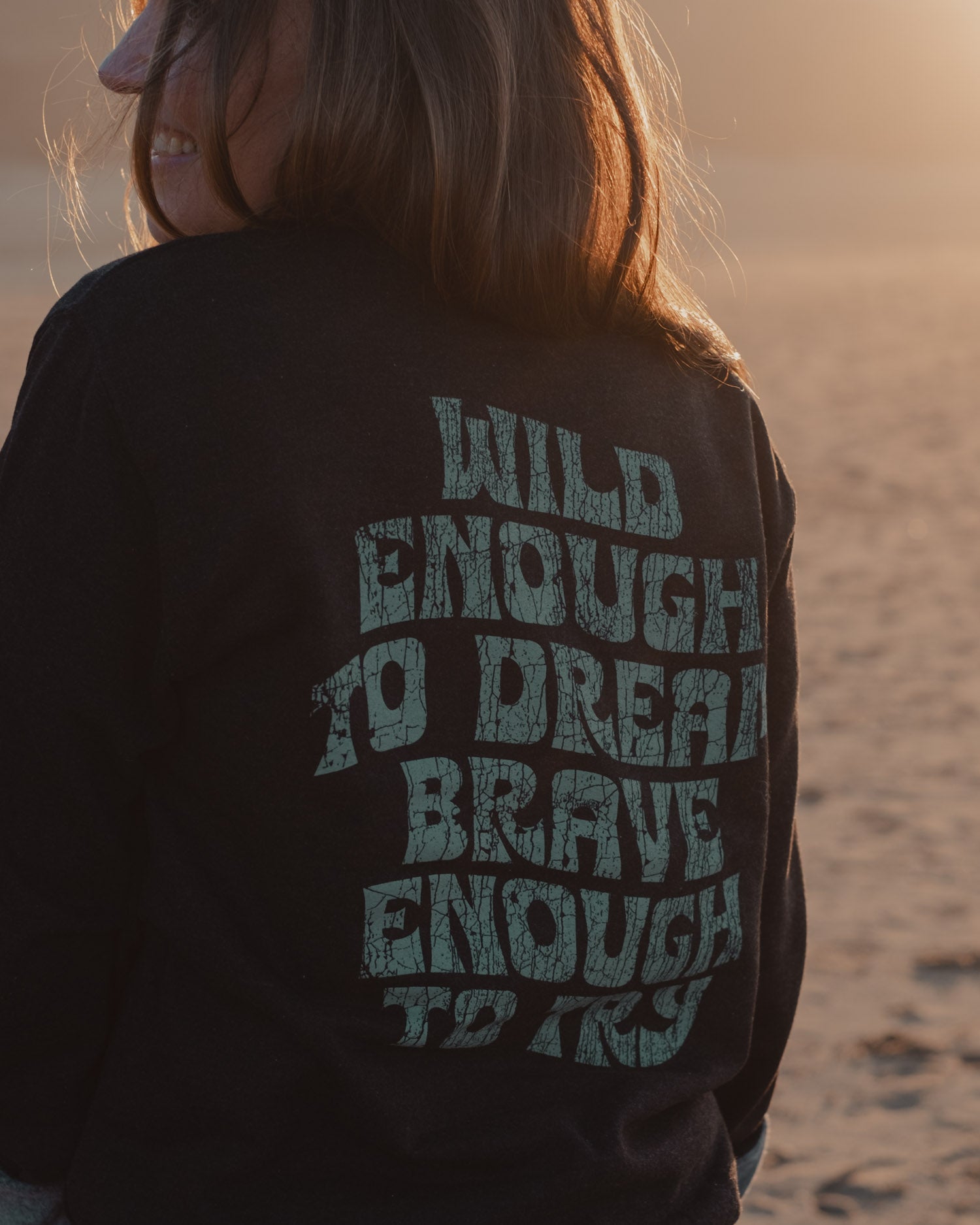 Wild Dreamer black sweatshirt with surfer by ART DISCO Original Goods
